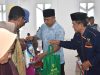 Bupati Natsir Ali Bagikan Ribuan Paket Ramadhan Bahagia